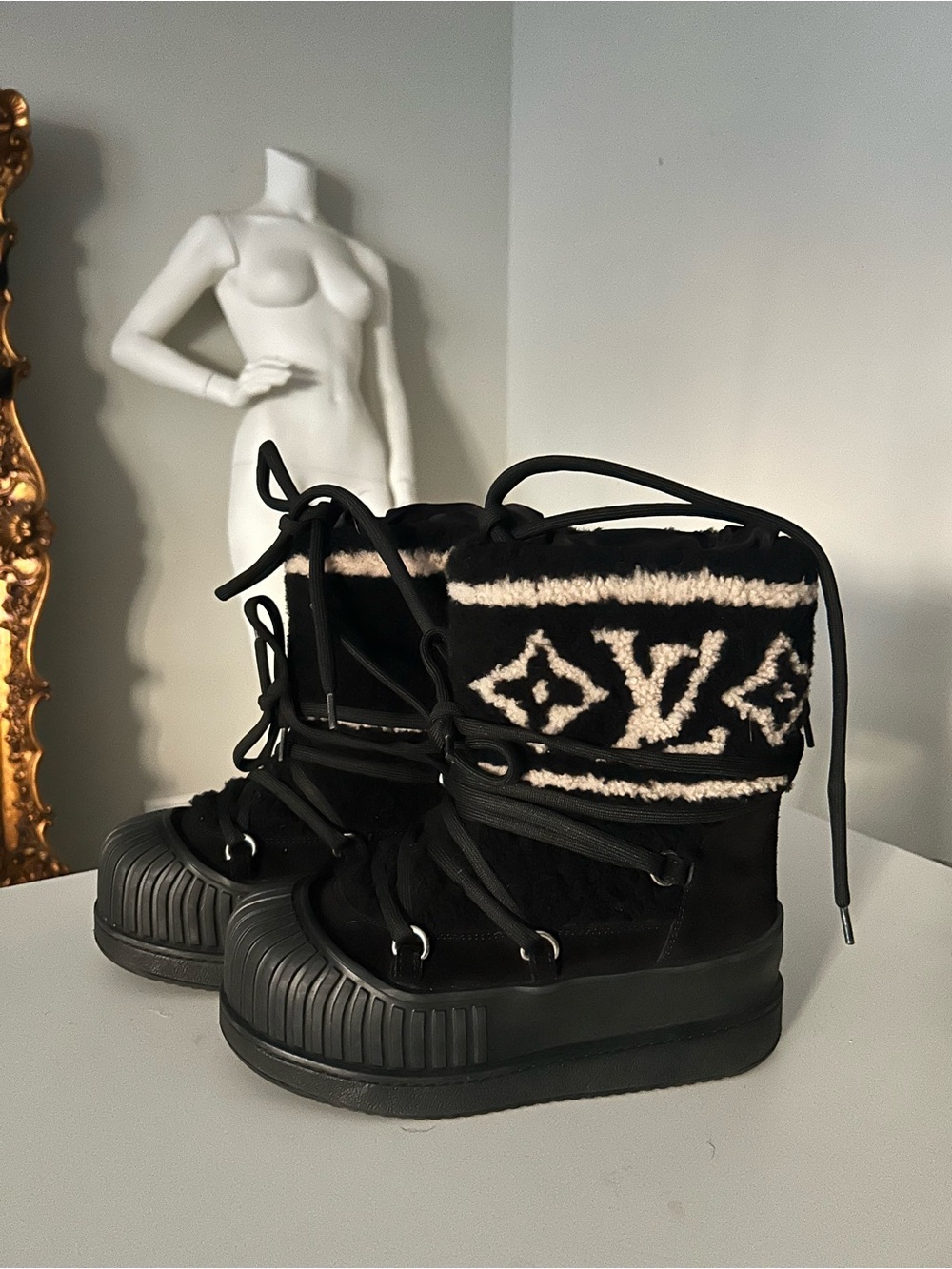 Louis Vuitton Black Knit-Trim Winter Boots with Monogram Detail.